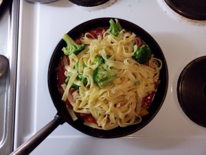 Pasta with sausage in tomatosauce
